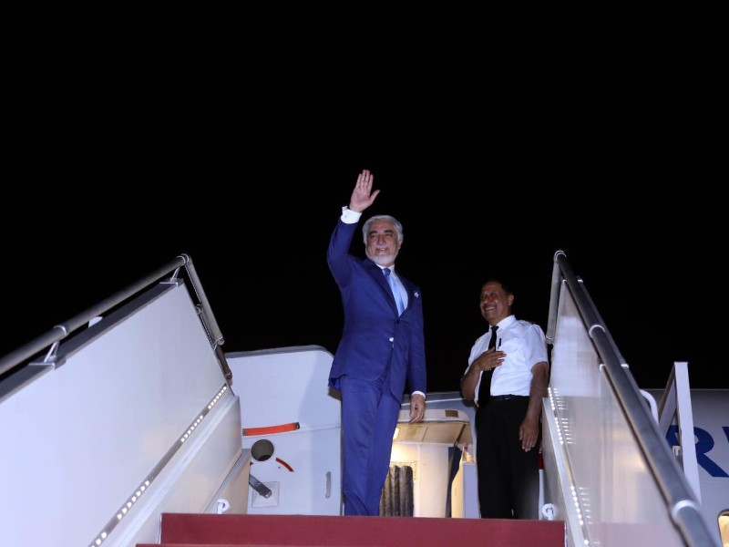 dr abdullah abdullah chairman afghanistan s high council for national reconciliation hcnr waves at the airport after concluding a three day official visit to pakistan photo twitter drabdullahce