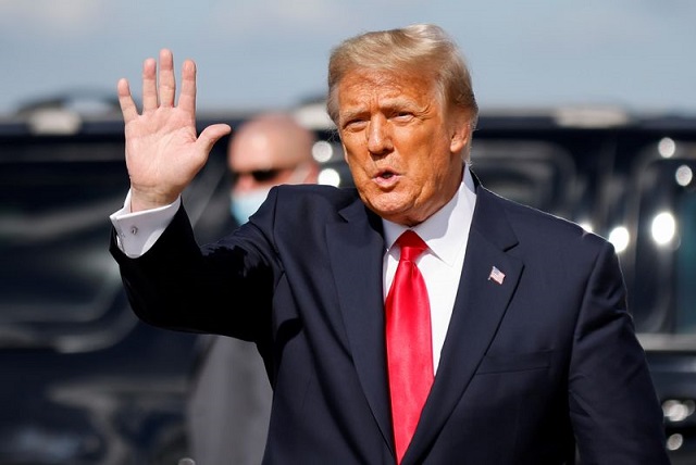 us president donald trump waves as he arrives at palm beach international airport in west palm beach florida us january 20 2021 photo reuters