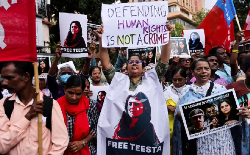 protestors demand the release of activist teesta setalvad after she was arrested from her home by the anti terrorism wing of the gujarat police on a street in mumbai india june 27 2022 photo reuters protestors demand the release of activist teesta setalvad after she was arrested from her home by the anti terrorism wing of the gujarat police on a street in mumbai india june 27 2022 photo reuters
