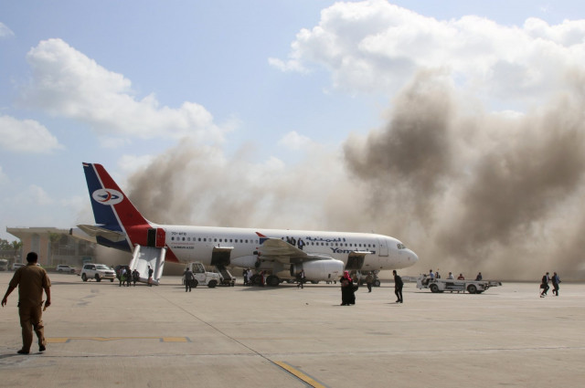 dust rises after explosions hit aden international airport in aden yemen dec 30 2020 photo reuters file
