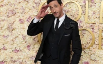 adrien brody criticized for long oscars speech after tossing gum at girlfriend