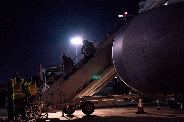 british nationals and afghan evacuees depart a flight from afghanistan at raf brize norton britain august 26 2021 photo reuters