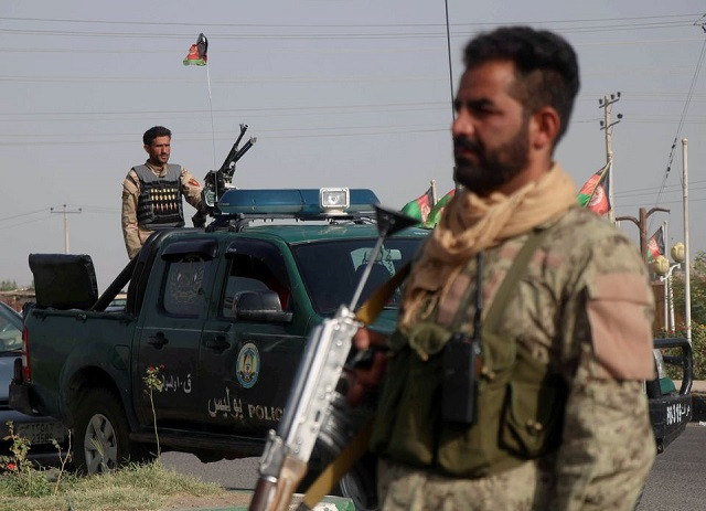 afghan security forces keep watch at a checkpoint in the guzara district of herat province afghanistan july 9 2021 photo reuters