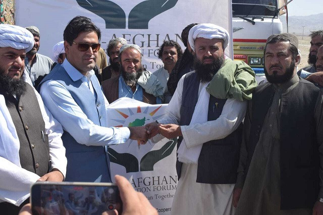 pakistani representative hand over humanitarian aid to afghan representatives photo express muhammad zafar