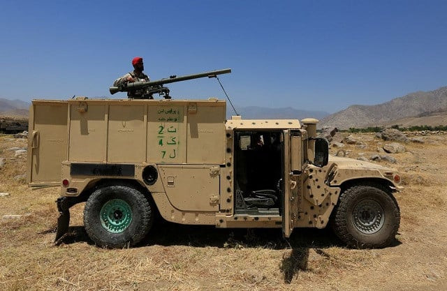 an afghan national army ana soldier stands guard near a checkpoint recaptured from the taliban in the alishing district of laghman province afghanistan july 8 2021 photo reuters an afghan national army ana soldier stands guard near a checkpoint recaptured from the taliban in the alishing district of laghman province afghanistan july 8 2021 photo reuters