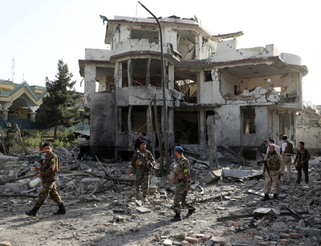 afghan national army ana soldiers keep watch a the site of yesterday s night time car bomb blast in kabul afghanistan august 4 2021 photo reuters afghan national army ana soldiers keep watch a the site of yesterday s night time car bomb blast in kabul afghanistan august 4 2021 photo reuters