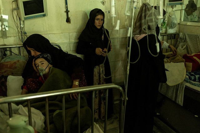 a family is seen at the intensive care unit at the indira gandhi hospital in kabul afghanistan october 24 2021 photo reuters