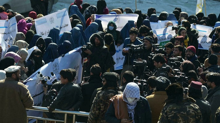 afghan journalists covering a protest by women in support of the taliban regime in front of the us embassy in kabul photo afp