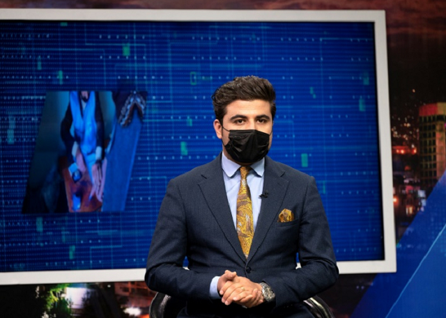 male presenters are broadcasting programmes on air wearing black medical masks photo afp male presenters are broadcasting programmes on air wearing black medical masks photo afp