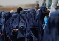 displaced afghan women stand waiting to receive cash aid for displaced people in kabul afghanistan july 28 2022 photo reuters