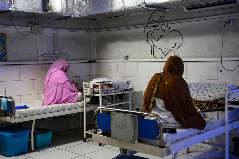 afghan women sit beside their newborns at the msf run maternity hospital in khost afghanistan december 8 2023 photo afp