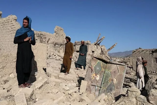 afghan men stand on the debris of damaged houses after the recent earthquake in wor kali village in the barmal district of paktika province afghanistan june 25 2022 photo reuters afghan men stand on the debris of damaged houses after the recent earthquake in wor kali village in the barmal district of paktika province afghanistan june 25 2022 photo reuters