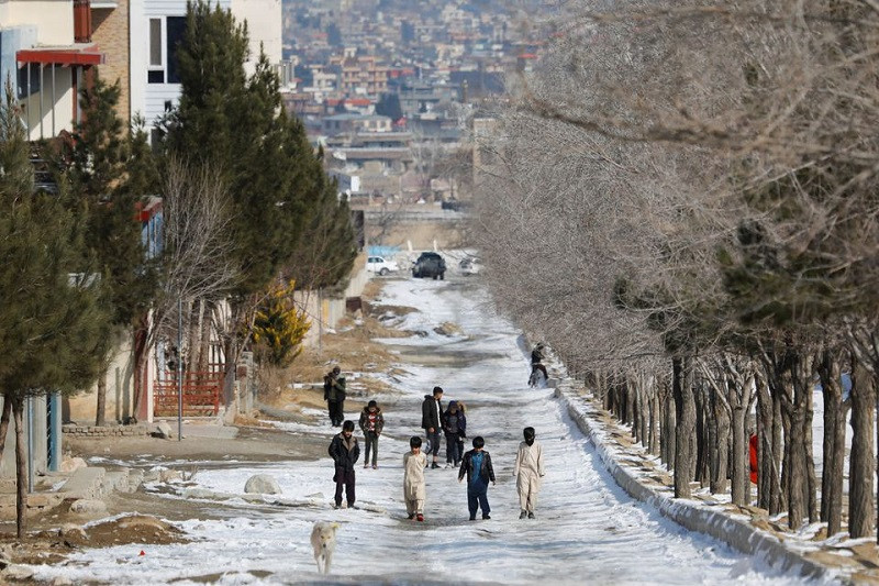 people walk on a snow covered street in kabul afghanistan january 26 2023 photo reuters