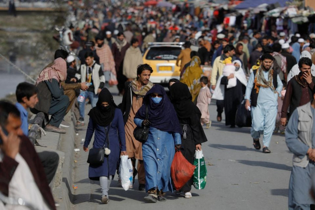 people walk in a street in kabul afghanistan november 9 2022 photo reuters people walk in a street in kabul afghanistan november 9 2022 photo reuters