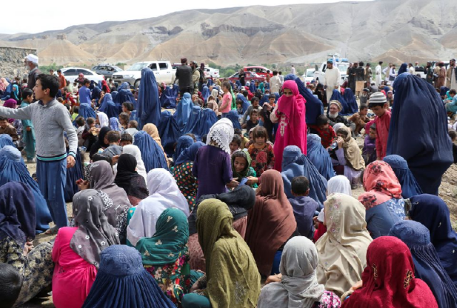 displaced afghan families spend time together after the heavy flood in the khushi district of logar afghanistan august 21 2022 photo reuters displaced afghan families spend time together after the heavy flood in the khushi district of logar afghanistan august 21 2022 photo reuters