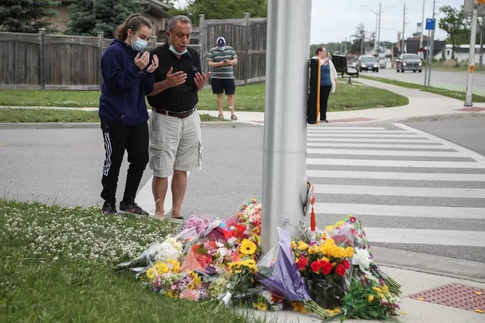 abdullah alzureiqi and his daughter hala say a prayer at the fatal crime scene where a man driving a pickup truck jumped the curb and ran over a muslim family in what police say was a deliberately targeted anti islamic hate crime in london ontario canada june 7 2021 photo reuters abdullah alzureiqi and his daughter hala say a prayer at the fatal crime scene where a man driving a pickup truck jumped the curb and ran over a muslim family in what police say was a deliberately targeted anti islamic hate crime in london ontario canada june 7 2021 photo reuters