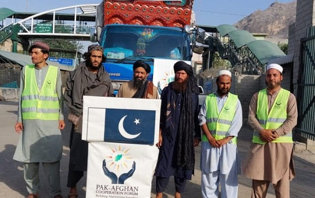 the convoy of eight trucks is being loaded with the relief goods arranged by the ndma photo app file the convoy of eight trucks is being loaded with the relief goods arranged by the ndma photo app file