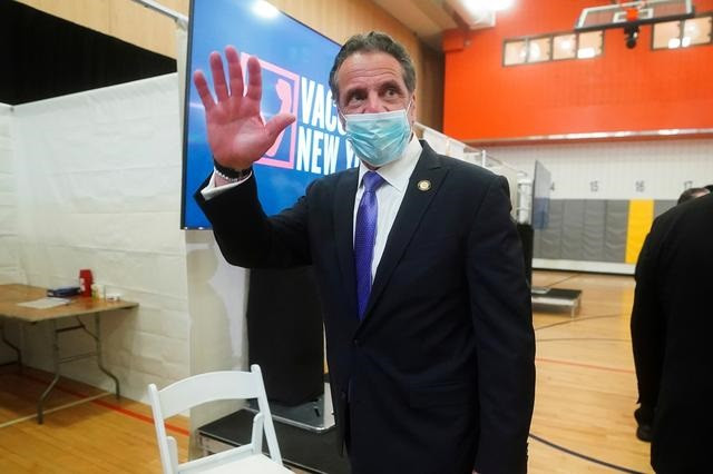 new york governor andrew cuomo waves goodbye as he departs an event amid the coronavirus disease covid 19 pandemic in the bronx borough of new york city new york us march 26 2021 photo reuters