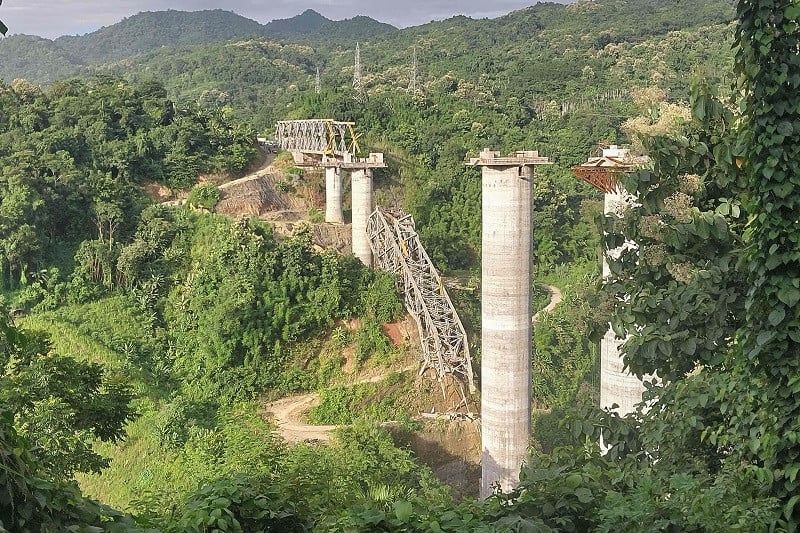 this photograph shows the site of an under construction railway bridge that collapsed in sairang town of the aizwal district in india s eastern state of mizoram on august 23 2023 photo afp