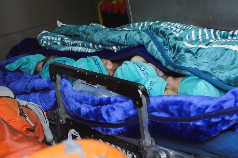 Premature babies, who were evacuated from Al Shifa hospital, lie in an ambulance before they are transported for treatment in UAE, at Rafah border crossing with Egypt, in Rafah, in the southern Gaza Strip, November 20, 2023. PHOTO: REUTERS