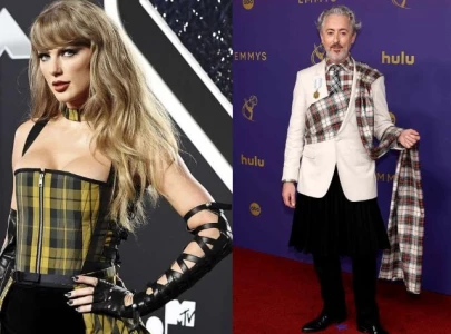 alan cumming jokes that taylor swift stole my look after both wear plaid at 2024 awards shows alan cumming jokes that taylor swift stole my look after both wear plaid at 2024 awards shows