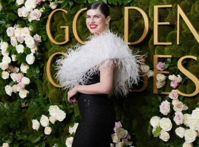 alexandra daddario stuns at melbourne grand prix with vip experience