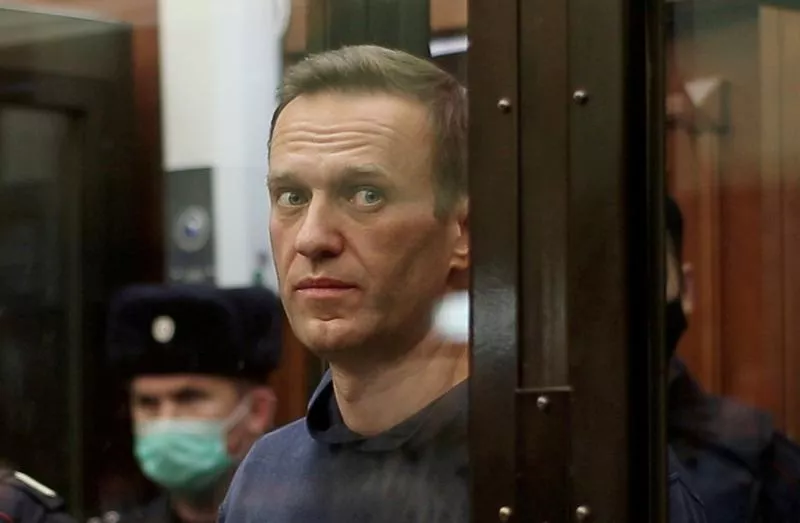 a still image taken from video footage shows russian opposition leader alexei navalny who is accused of flouting the terms of a suspended sentence for embezzlement inside a defendant dock during the announcement of a court verdict in moscow russia february 2 2021 photo reuters file a still image taken from video footage shows russian opposition leader alexei navalny who is accused of flouting the terms of a suspended sentence for embezzlement inside a defendant dock during the announcement of a court verdict in moscow russia february 2 2021 photo reuters file