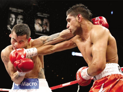 amir khan retains wba crown