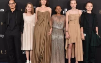 brad pitt and angelina jolie s son maddox makes name change official in film debut