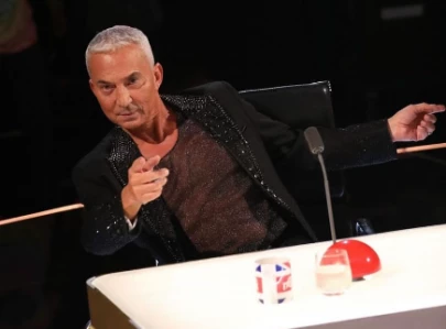 dogs vs judges britain s got talent judge bruno tonioli s remark fuels rumors of feud
