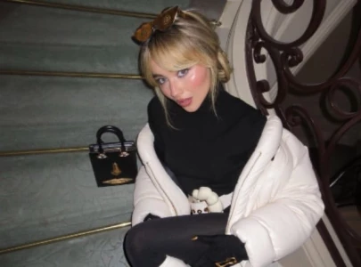 sabrina carpenter makes catwalk debut at vogue world paris struts through in aquatic inspired look sabrina carpenter makes catwalk debut at vogue world paris struts through in aquatic inspired look