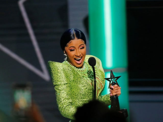 Cardi B Sparks Pregnancy Rumors With Covert Look at Hollywood Awards