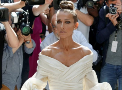 celine dion attends hauser concert with twin sons in rare public outing