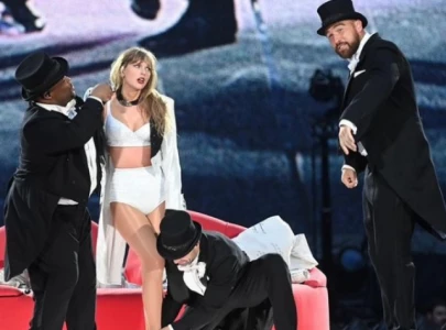 kameron saunders reflects on sharing stage with travis kelce at eras tour and kelce responds