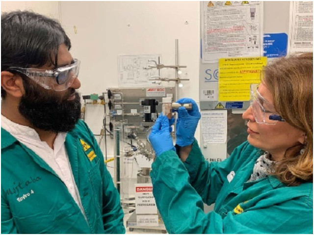 phd candidate muhammad haris left and professor nicky eshtiaghi with the magnetic material that they developed into adsorbents that remove microplastics and dissolved pollutants from water photo rmit university