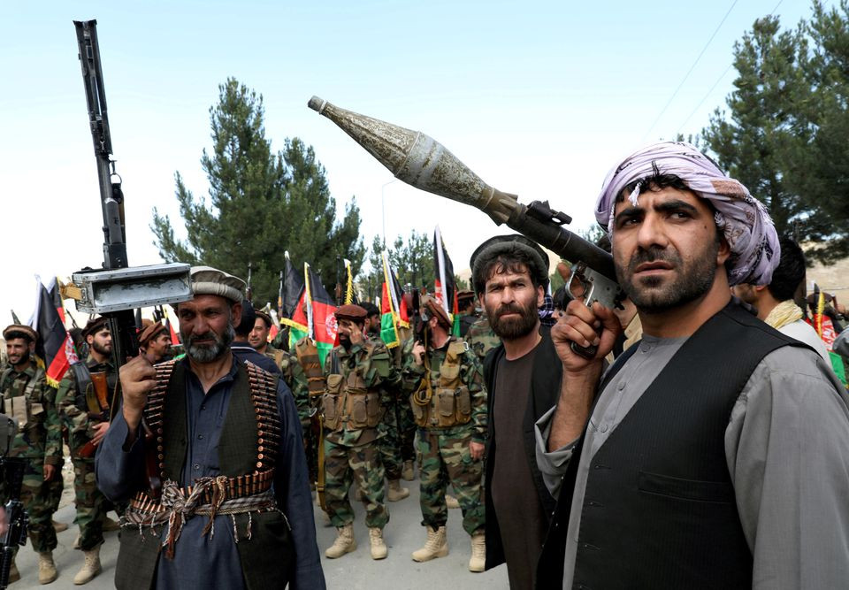 armed men attend a gathering to announce their support for afghan security forces and that they are ready to fight against the taliban on the outskirts of kabul afghanistan june 23 2021 photo reuters