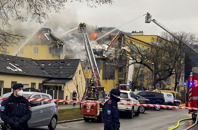 rescue workers are seen at the site of an explosion of a house in langenzersdorf austria january 29 2021 photo reuters