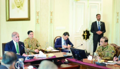 security huddle army chief gen asim munir listens as prime minister shehbaz sharif speaks during an apex committee meeting photo express