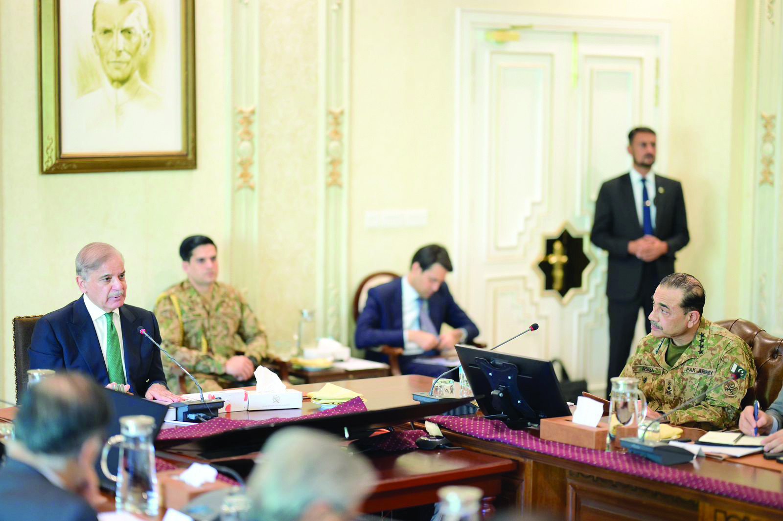 security huddle army chief gen asim munir listens as prime minister shehbaz sharif speaks during an apex committee meeting photo express