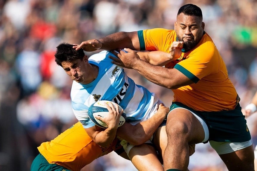 argentina centre lucio cinti is tackled by australia prop taniela tupou and centre hamish stewart photo afp