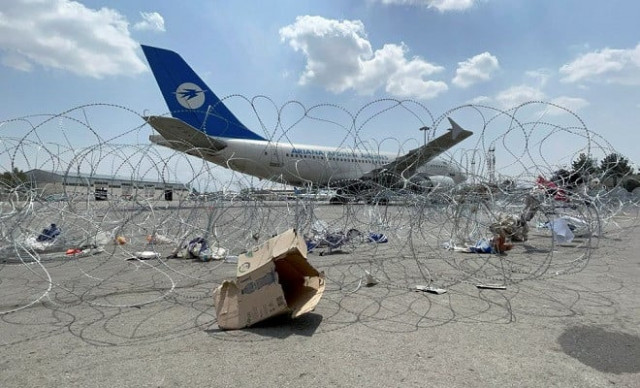 a commercial airplane is seen at the hamid karzai international airport a day after us troops withdrawal in kabul afghanistan august 31 2021 photo reuters a commercial airplane is seen at the hamid karzai international airport a day after us troops withdrawal in kabul afghanistan august 31 2021 photo reuters