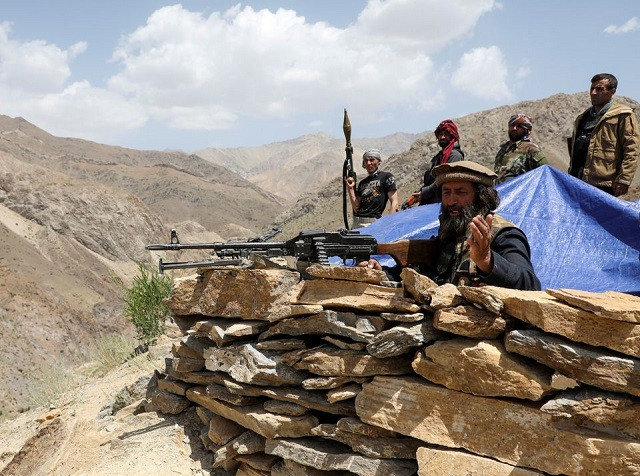 armed men who are against taliban uprising stand at their check post at the ghorband district parwan province afghanistan june 29 2021 photo reuters