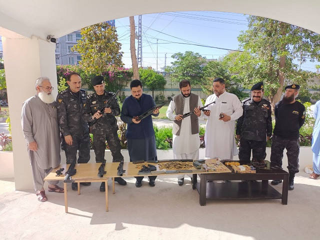 during the search officials found four kalashnikov rifles two us made m 4 machine guns and one sniper scope as well as thousands of different types of cartridges photo express abuzar afridi