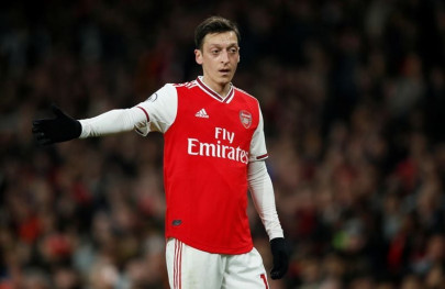 ozil disappointed after being axed from arsenal s premier league squad