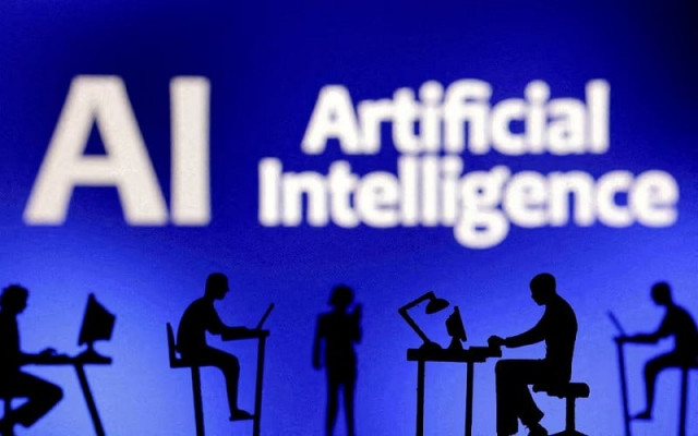 figurines with computers and smartphones are seen in front of the words artificial intelligence ai in this illustration taken february 19 2024 photo reuters figurines with computers and smartphones are seen in front of the words artificial intelligence ai in this illustration taken february 19 2024 photo reuters