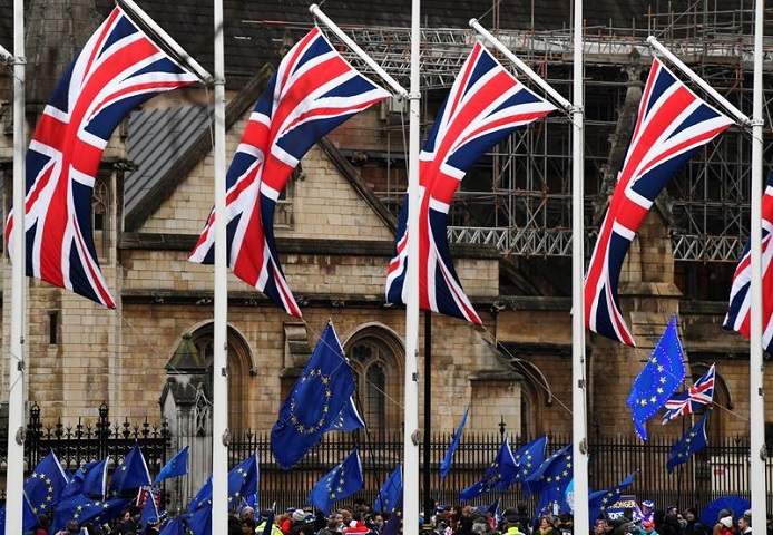 british union jack and eu flags are seen during a protest outside the houses of parliament in london britain january 30 2020 photo reuters