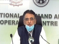 federal minister asad umar briefing the media at the ncoc photo file