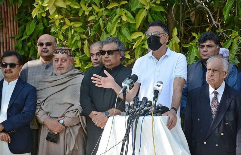 minister for planning development and special initiatives asad umar talks to media in karachi on january 30 2022 photo app