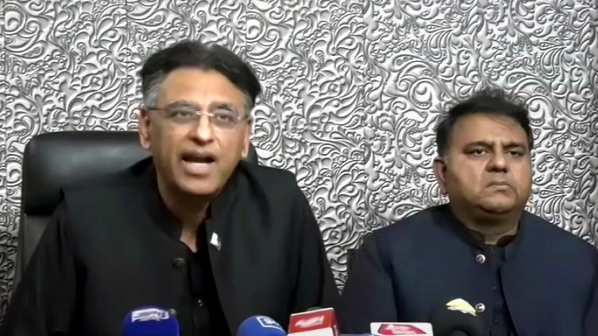 pakistan tehreek e insaf pti leader asad umar and ex minister fawad chaudhary addressing a press conference on march 23 2023 photo file
