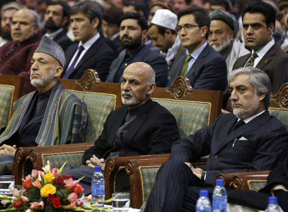 afghan president ashraf ghani c attends a commemoration of the first death anniversary of former vice president mohammad qasim fahim also known as the marshal of afghanistan in kabul march 9 2015 on the left is former president hamid karzai and chief executive abdullah abdullah is seen on the right photo reuters file